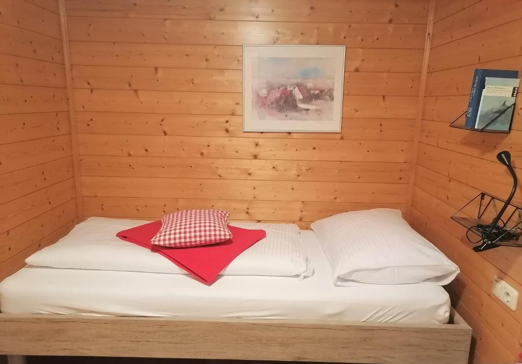 Postel nebo postele na pokoji v ubytování Ferienwohnung Brittenberg Alpaka