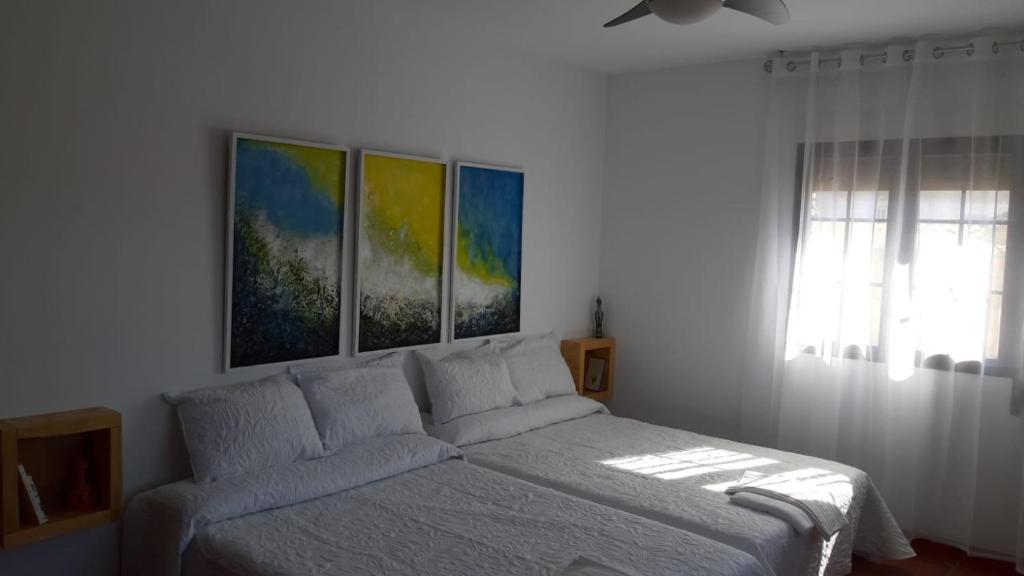 Postel nebo postele na pokoji v ubytování Villa Family Kids "Joropillo" - Full house rent
