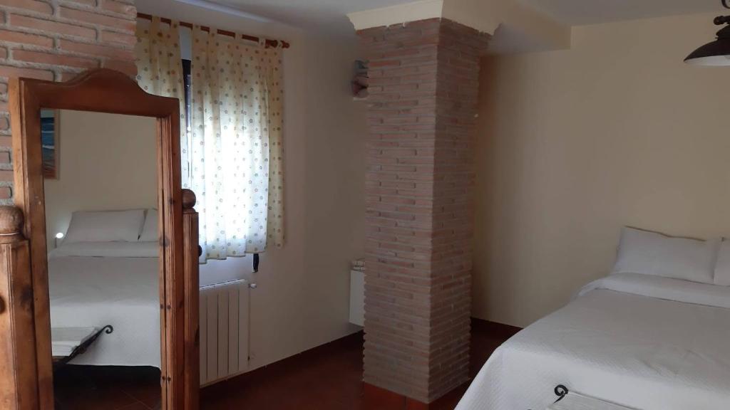 Postel nebo postele na pokoji v ubytování Villa Family Kids "Joropillo" - Full house rent