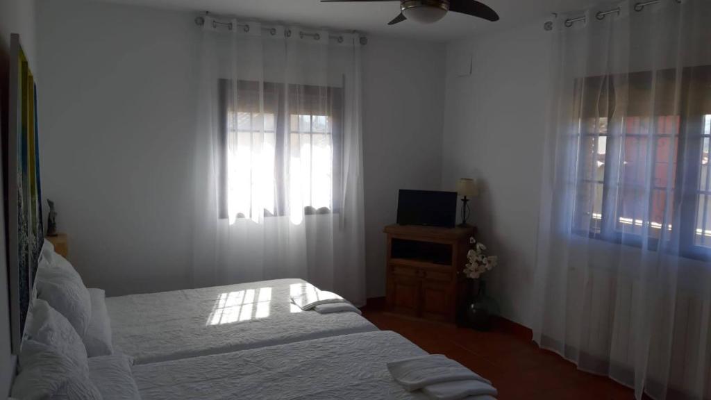 Postel nebo postele na pokoji v ubytování Villa Family Kids "Joropillo" - Full house rent