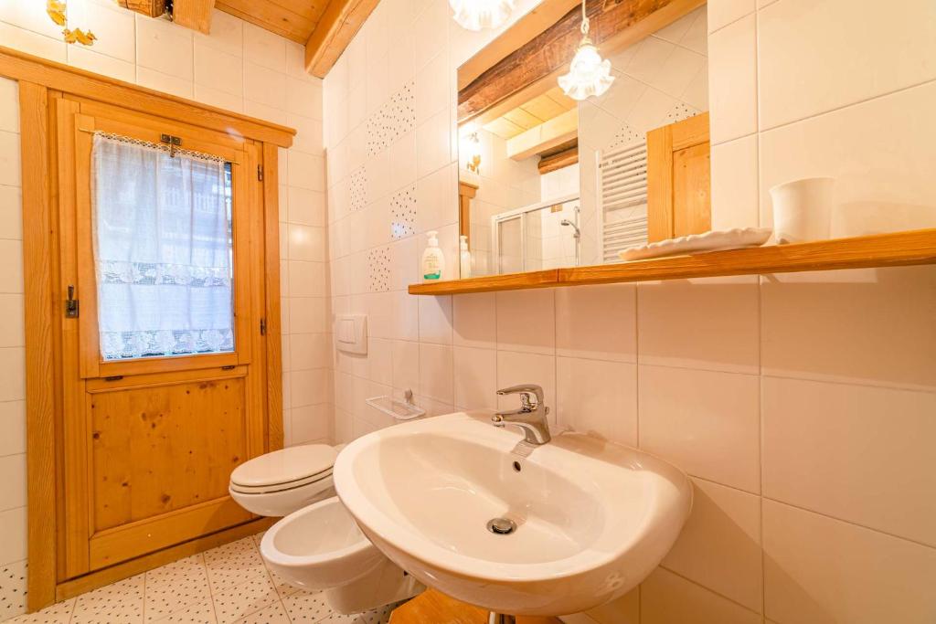 Koupelna v ubytování Chalet Sottoguda