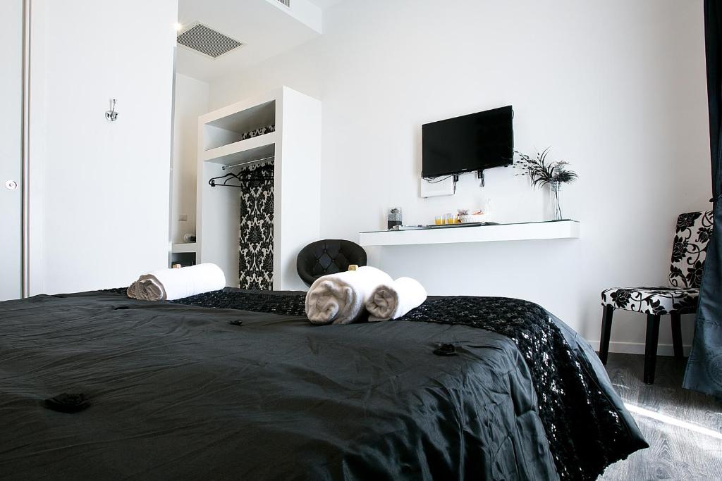 Posteľ alebo postele v izbe v ubytovaní Rome Key Home