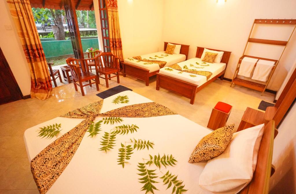 Postel nebo postele na pokoji v ubytování Vaana Resort