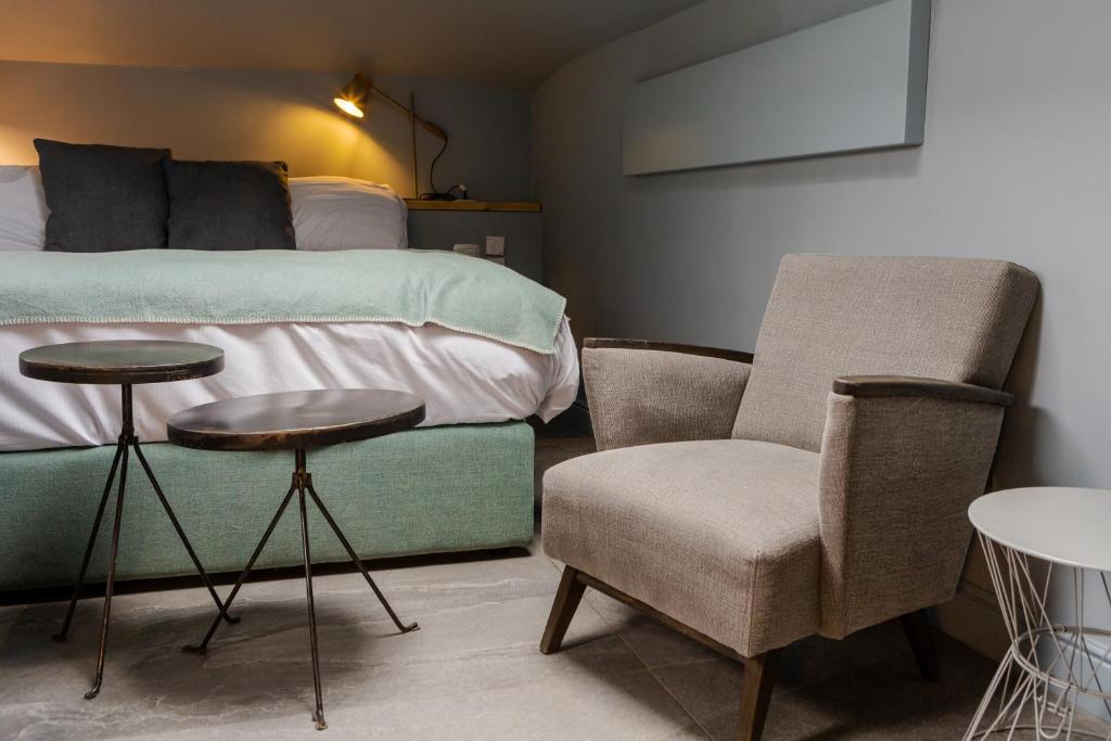 Uma área de estar em Bello!Lake Como Suites