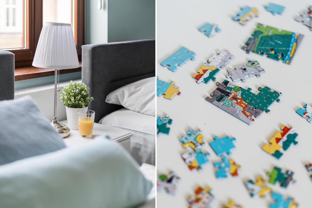 Posteľ alebo postele v izbe v ubytovaní Sanhaus Apartments - FANTAZJA - Apartament z dwoma balkonami - 100 m2