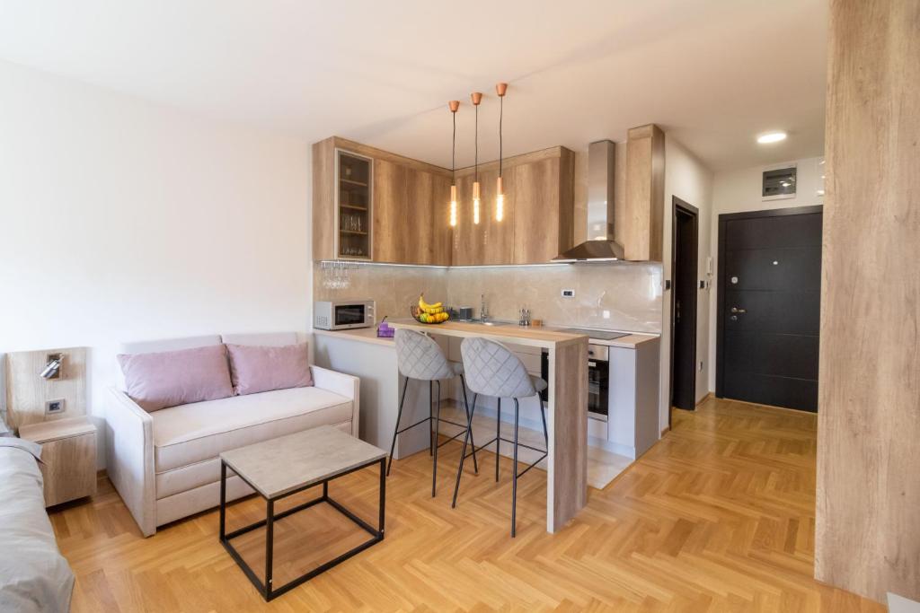 Apartment Bohemia tesisinde mutfak veya mini mutfak