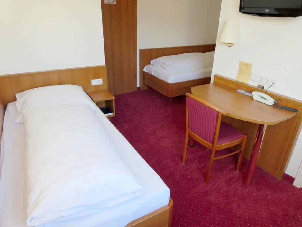 Postel nebo postele na pokoji v ubytování Hotel Find