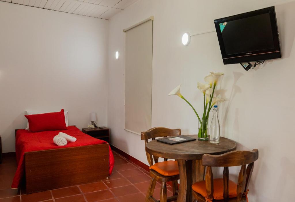 TV a/nebo společenská místnost v ubytování hotel villa claudia