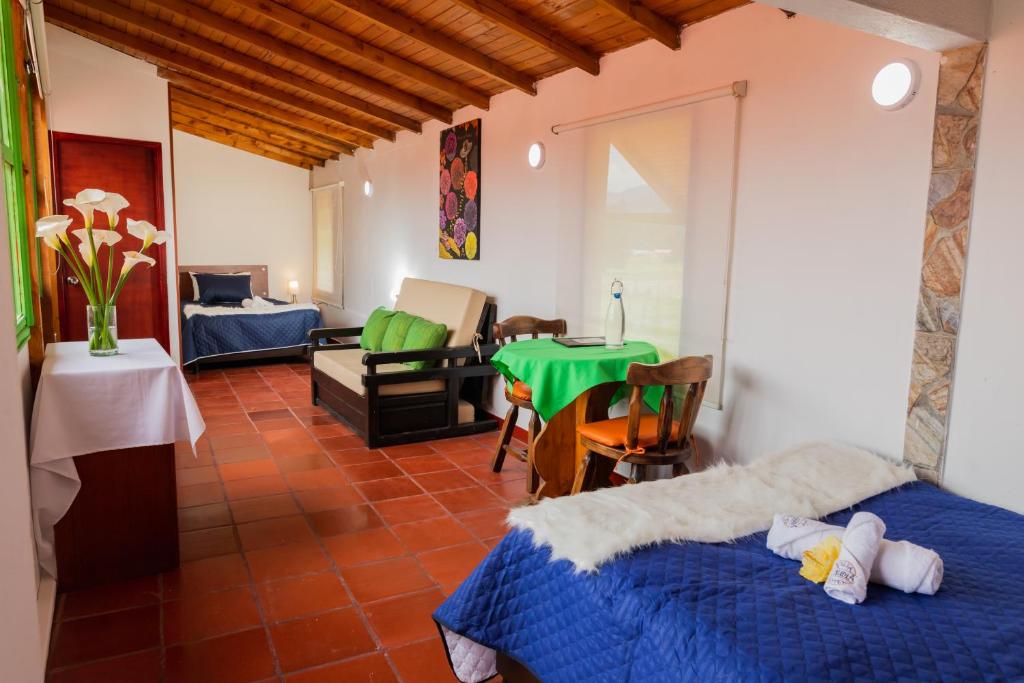 Postel nebo postele na pokoji v ubytování hotel villa claudia