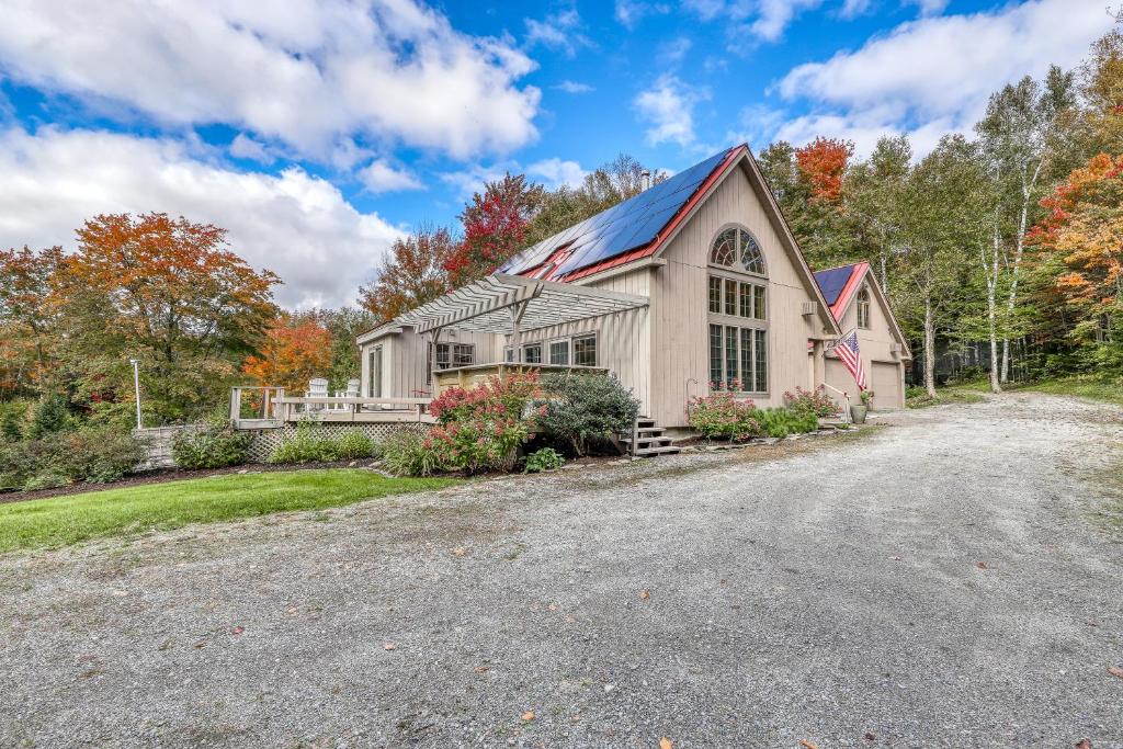 a large white house with a driveway at Winhall Wonder in French Hollow