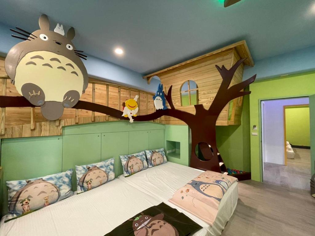 Postel nebo postele na pokoji v ubytování Kids Fun B&B