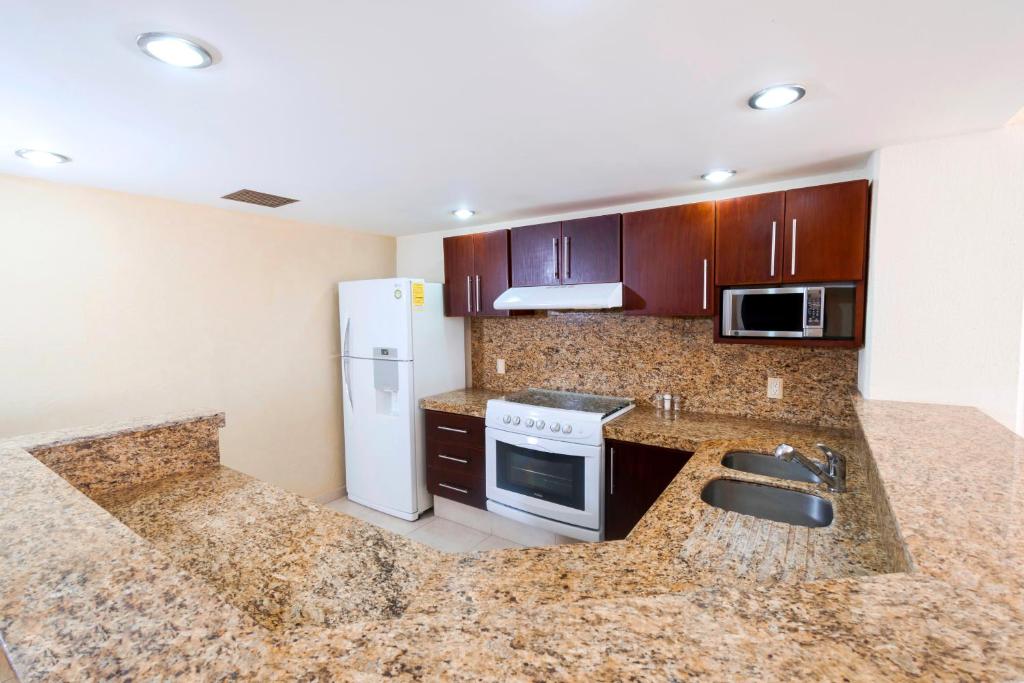 Kuchyň nebo kuchyňský kout v ubytování Topacio7 Residencial