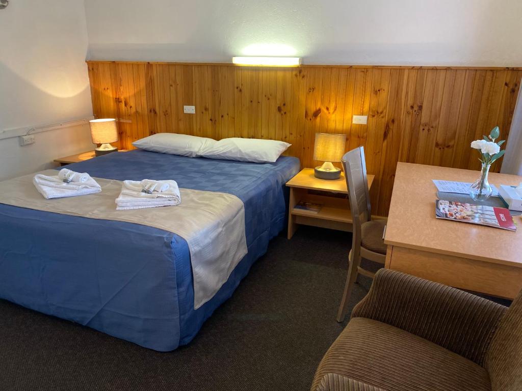Postel nebo postele na pokoji v ubytování Barossa Gateway Motel