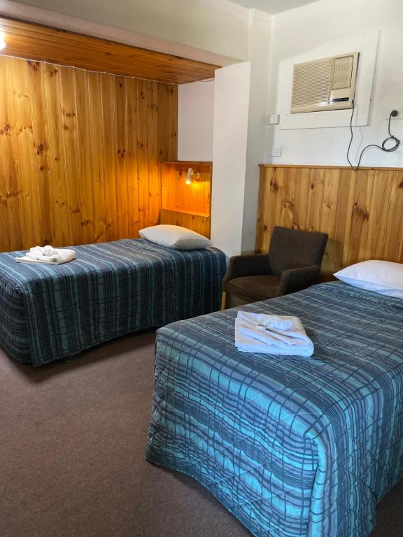 Postel nebo postele na pokoji v ubytování Barossa Gateway Motel