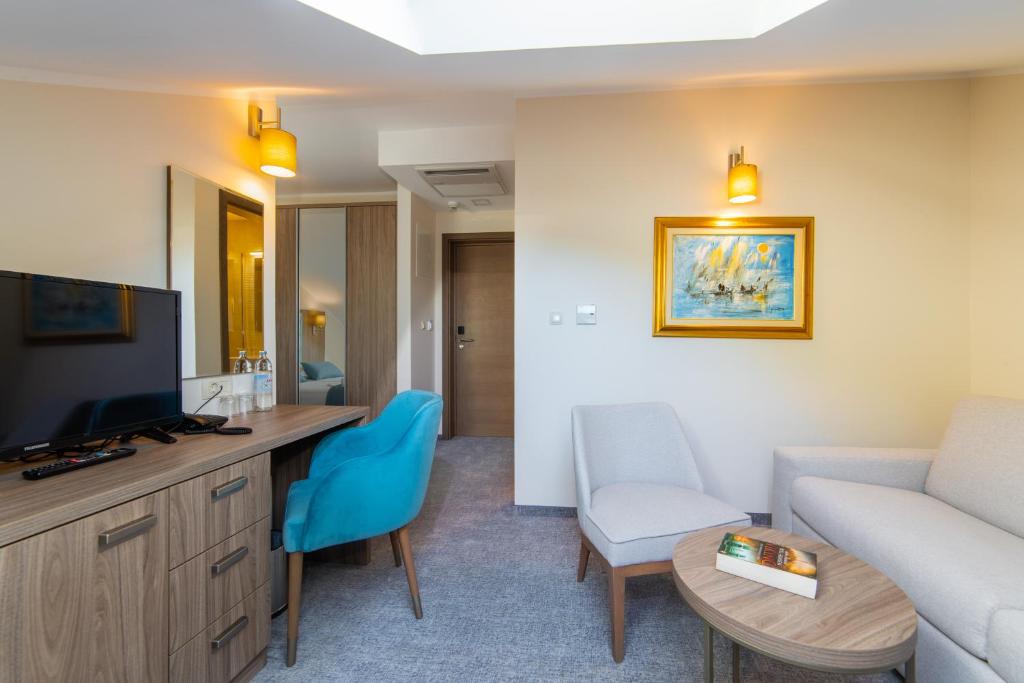 TV a/nebo společenská místnost v ubytování Hotel Bella Vista