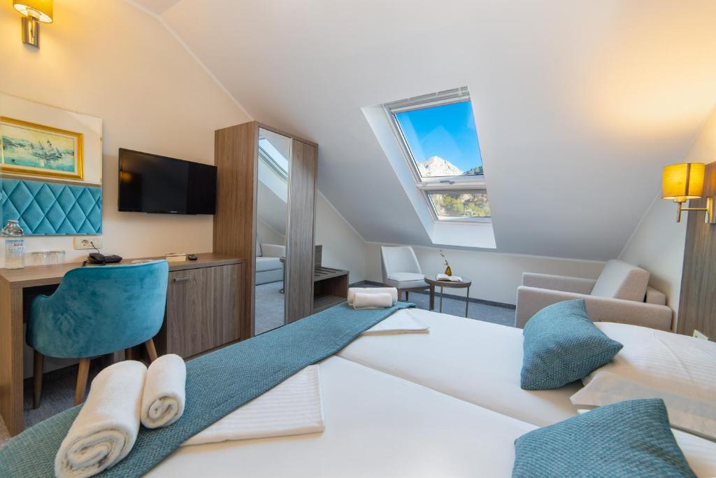 Postel nebo postele na pokoji v ubytování Hotel Bella Vista