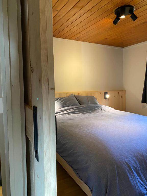 Postel nebo postele na pokoji v ubytování Chalet103 in La Boverie