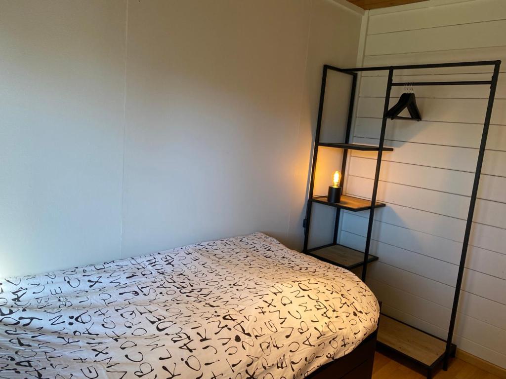 Postel nebo postele na pokoji v ubytování Chalet103 in La Boverie