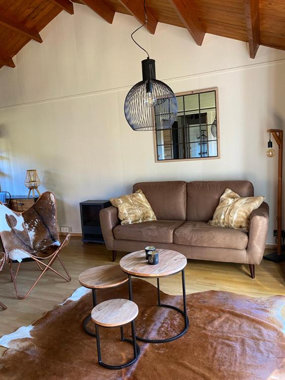 Posezení v ubytování Chalet103 in La Boverie