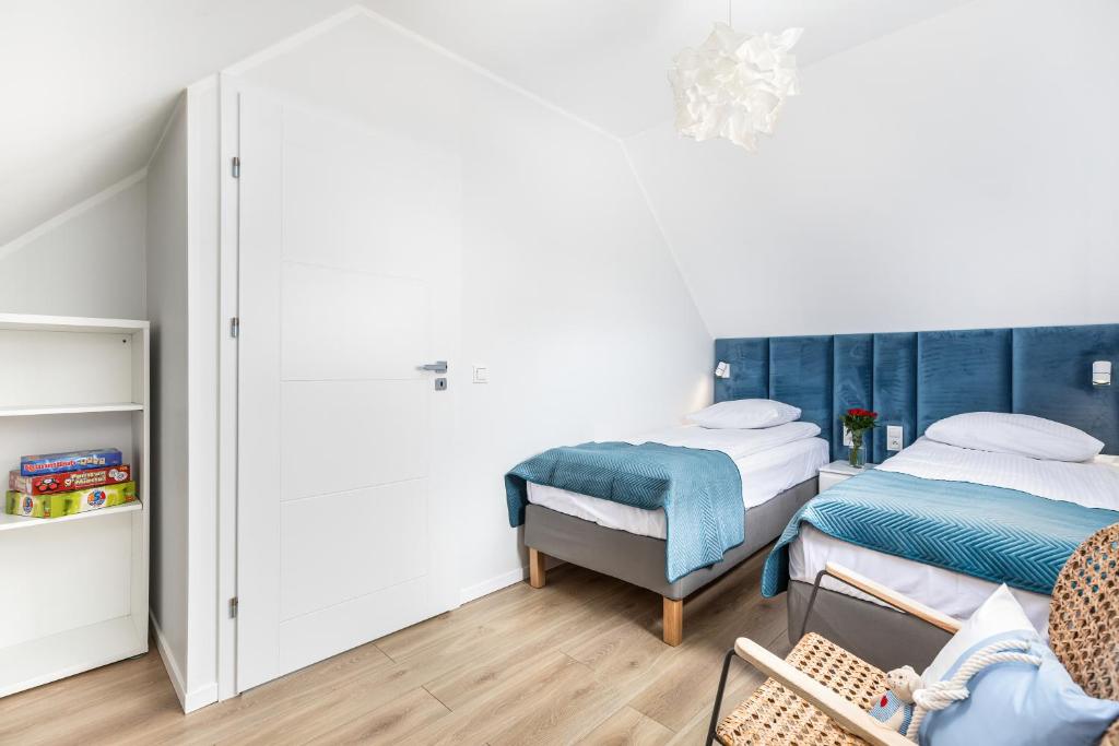 Voodi või voodid majutusasutuse Holiday Point toas