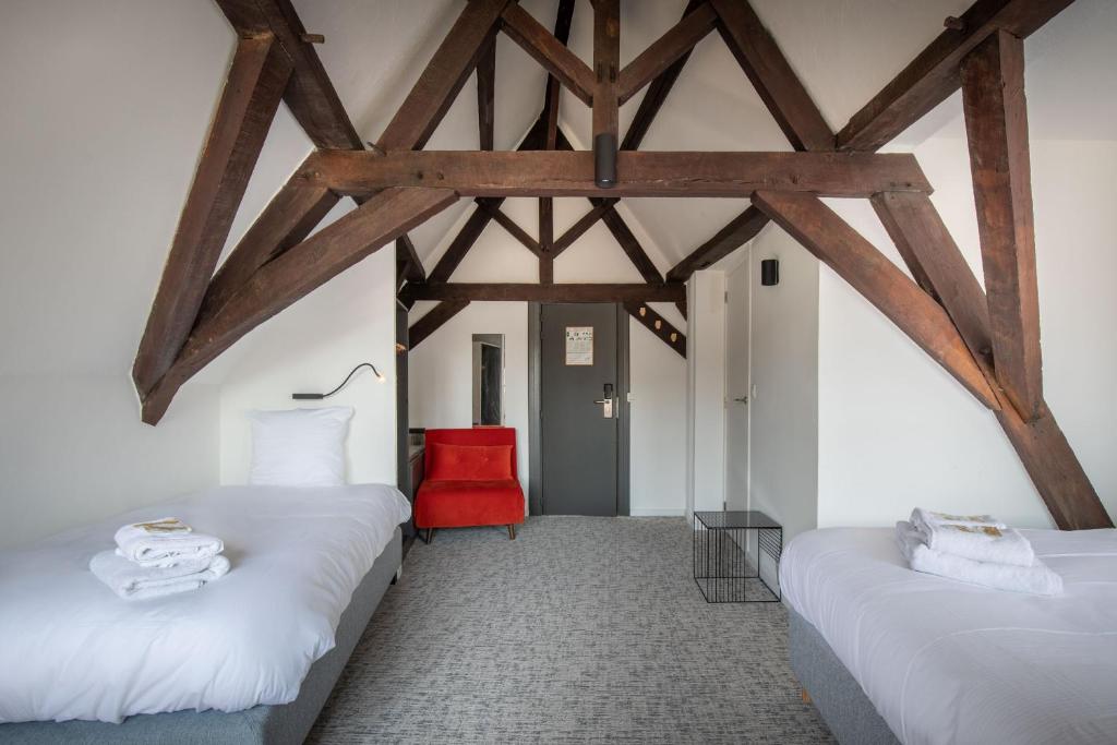 Postel nebo postele na pokoji v ubytování Hotel Augustyn Brugge
