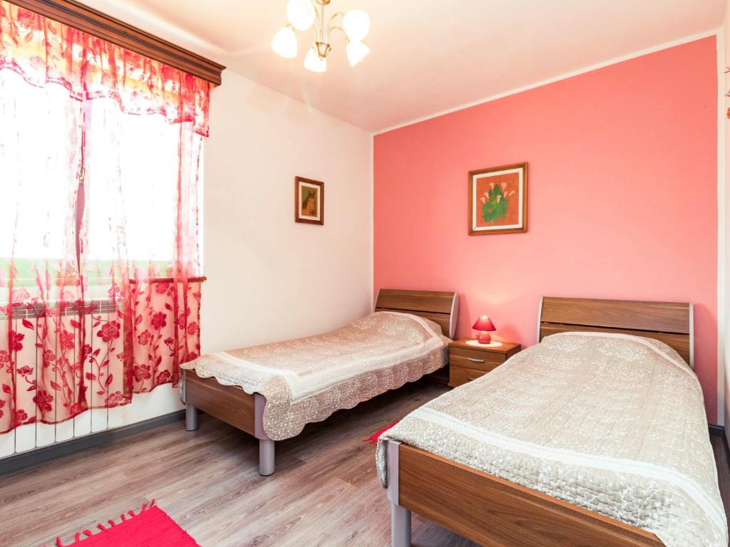 Posteľ alebo postele v izbe v ubytovaní Holiday Home Villa Helena by Interhome