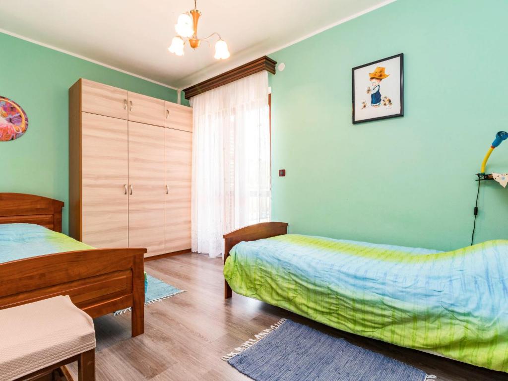 Posteľ alebo postele v izbe v ubytovaní Holiday Home Villa Helena by Interhome