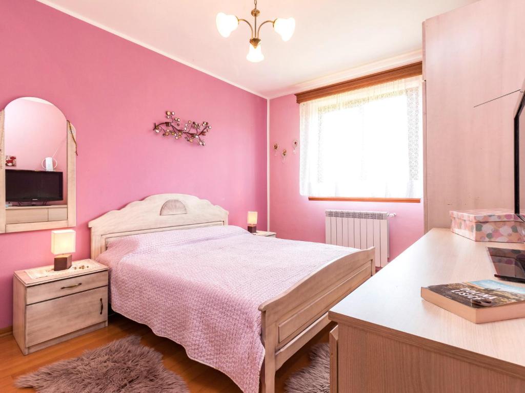 Posteľ alebo postele v izbe v ubytovaní Holiday Home Villa Helena by Interhome