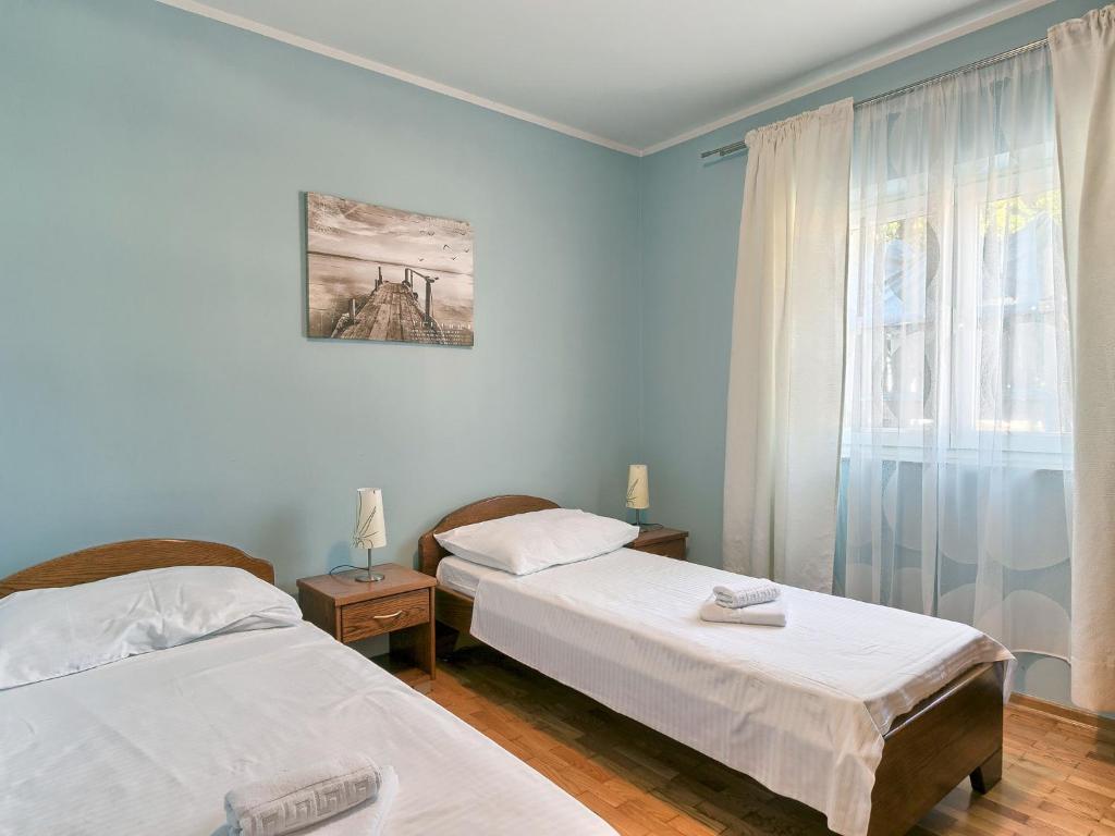Postel nebo postele na pokoji v ubytování Holiday Home VIlla Eldina by Interhome