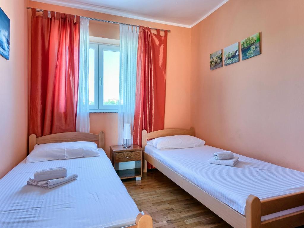 Postel nebo postele na pokoji v ubytování Holiday Home VIlla Eldina by Interhome