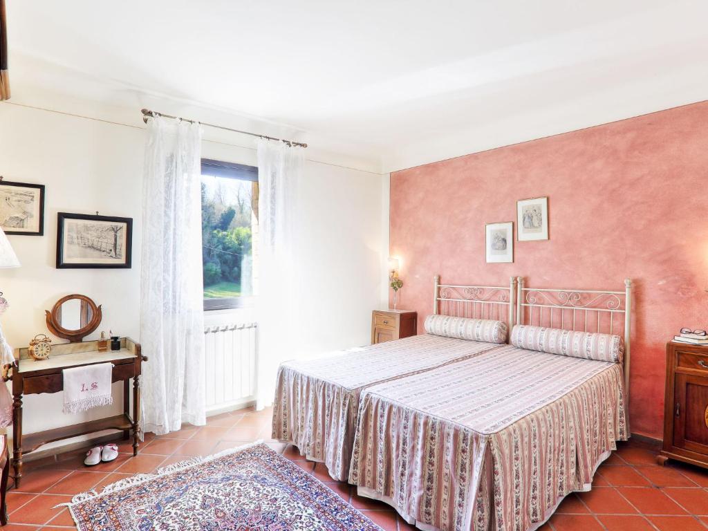 Posteľ alebo postele v izbe v ubytovaní Villa Fonte di Pillo by Interhome