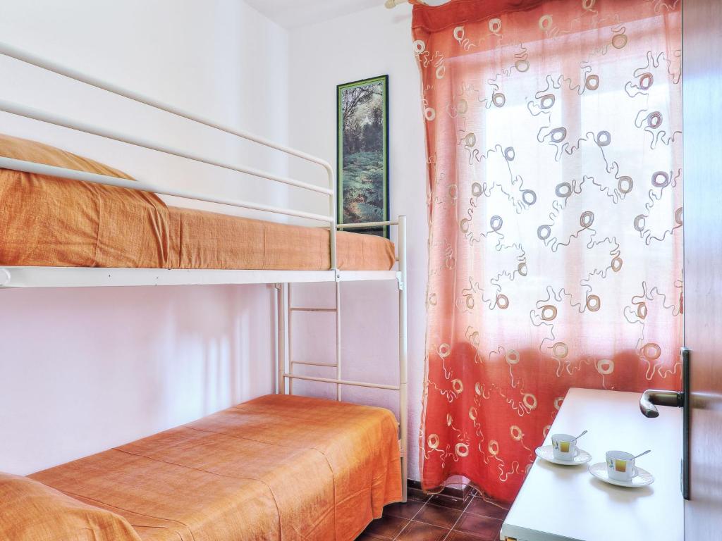 Łóżko lub łóżka w pokoju w obiekcie Apartment Riviera 1 by Interhome