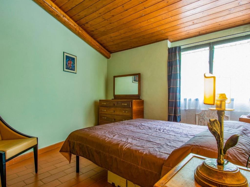 Posteľ alebo postele v izbe v ubytovaní Holiday Home La Fornace-4 by Interhome