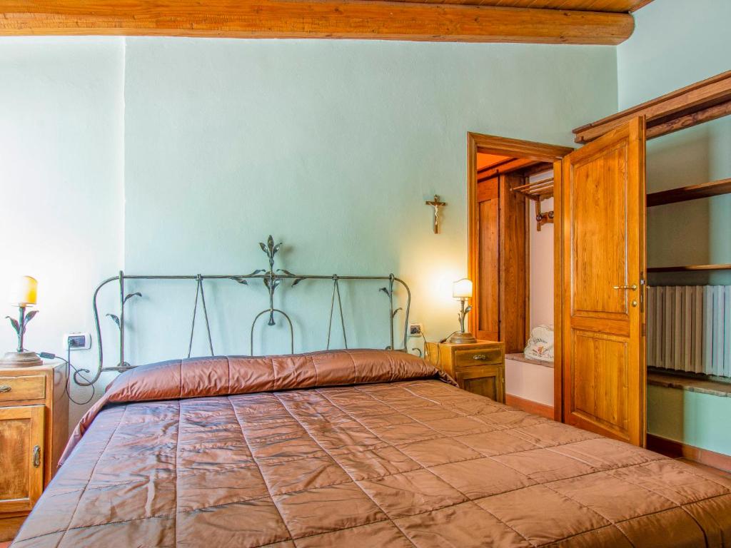 Posteľ alebo postele v izbe v ubytovaní Holiday Home La Fornace-4 by Interhome
