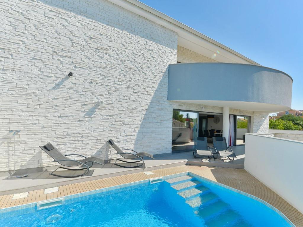 Πισίνα στο ή κοντά στο Holiday Home East by Interhome