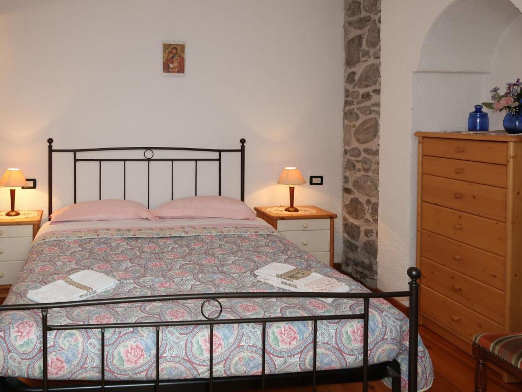 Posteľ alebo postele v izbe v ubytovaní Apartment Maso Marini - Appartamento Capriolo by Interhome