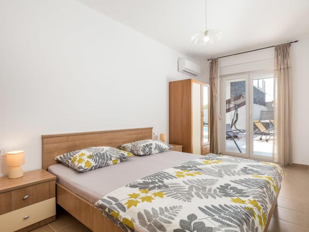 Postel nebo postele na pokoji v ubytování Holiday Home Villa Mira by Interhome