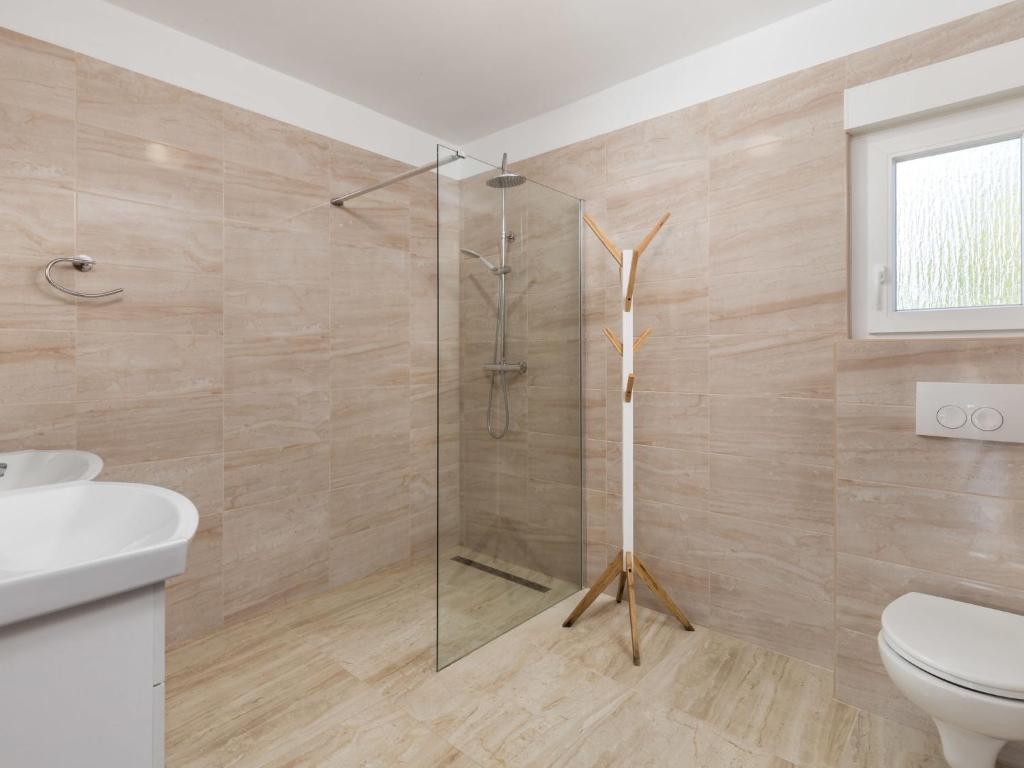 Koupelna v ubytování Holiday Home Villa Mira by Interhome