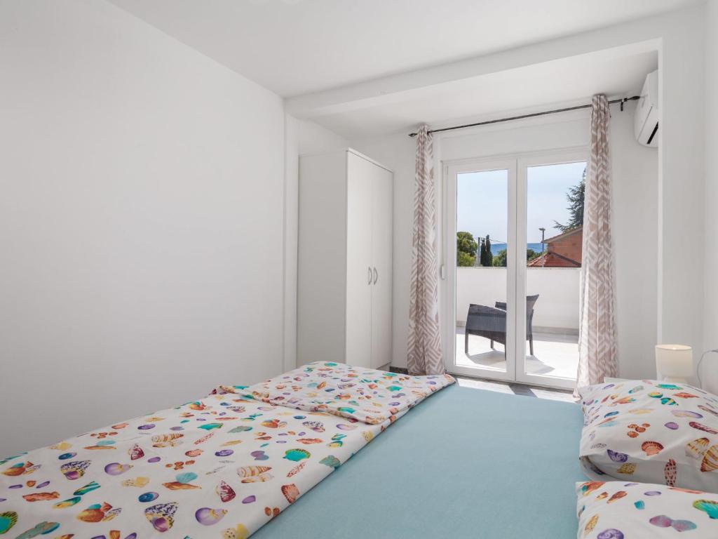 Postel nebo postele na pokoji v ubytování Holiday Home Villa Mira by Interhome
