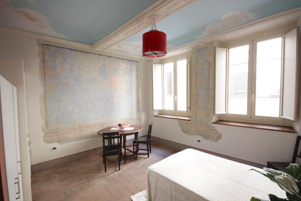 A seating area at Il Giardino Apartment