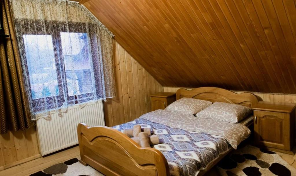 Postel nebo postele na pokoji v ubytování Шепіт Карпат