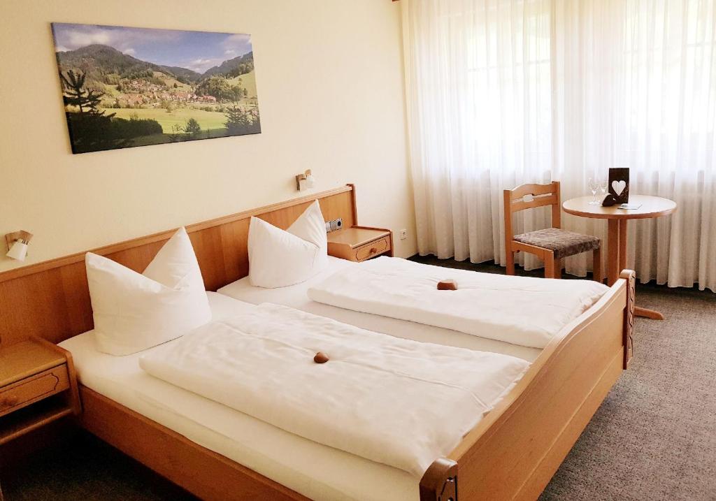 Postel nebo postele na pokoji v ubytování Hotel Walkenstein