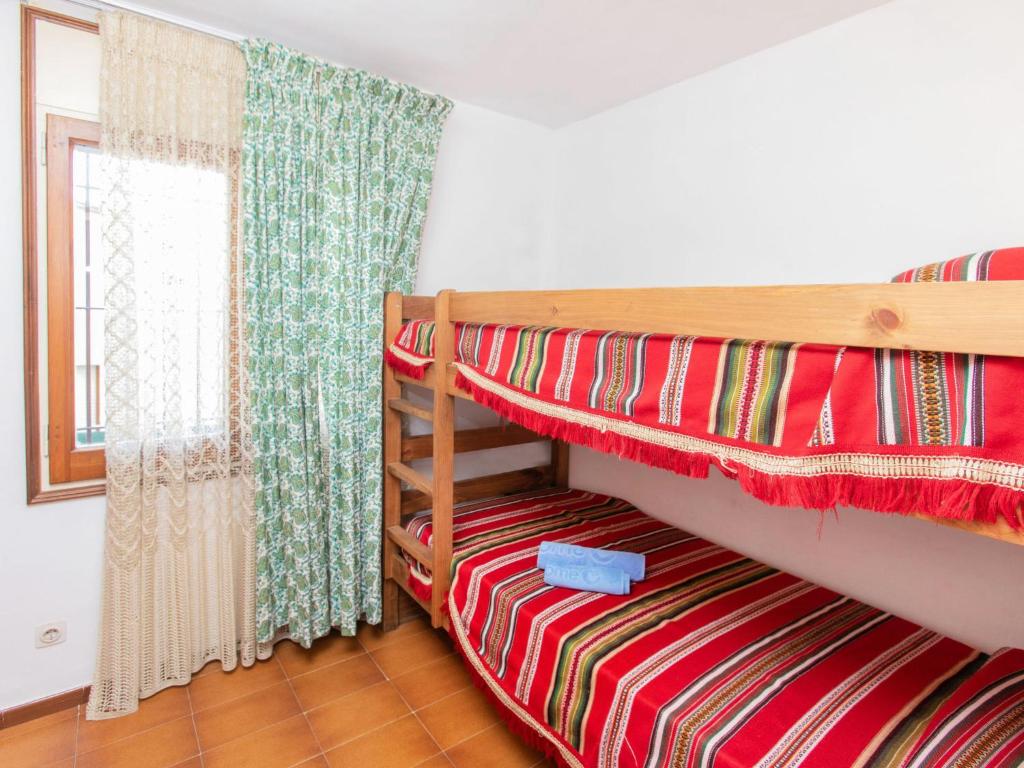 Posteľ alebo postele v izbe v ubytovaní Apartment Melis 1 by Interhome