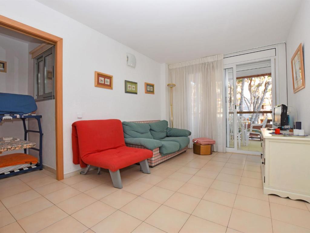 A seating area at Apartment Els Pins Eduardo-7 by Interhome