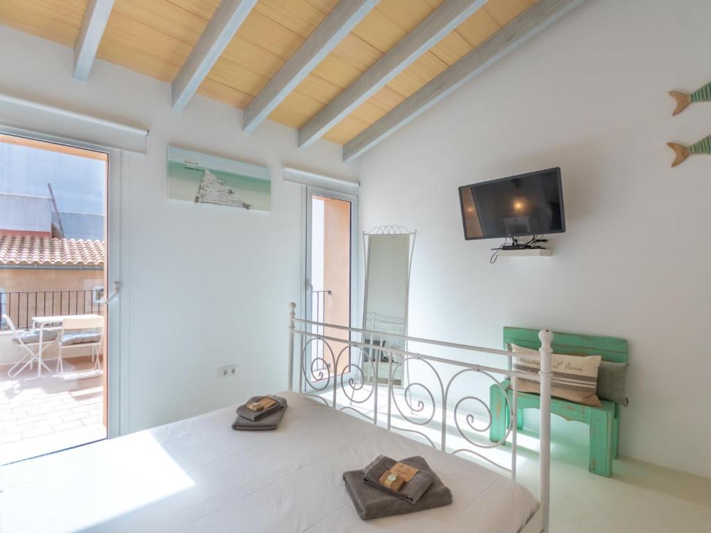 TV a/nebo společenská místnost v ubytování Holiday Home Can Regalat by Interhome