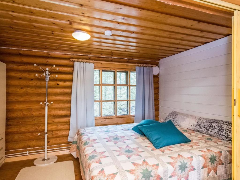 Postel nebo postele na pokoji v ubytování Holiday Home Mäntyranta by Interhome