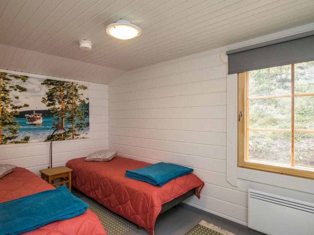 Postel nebo postele na pokoji v ubytování Holiday Home Mäntyranta by Interhome