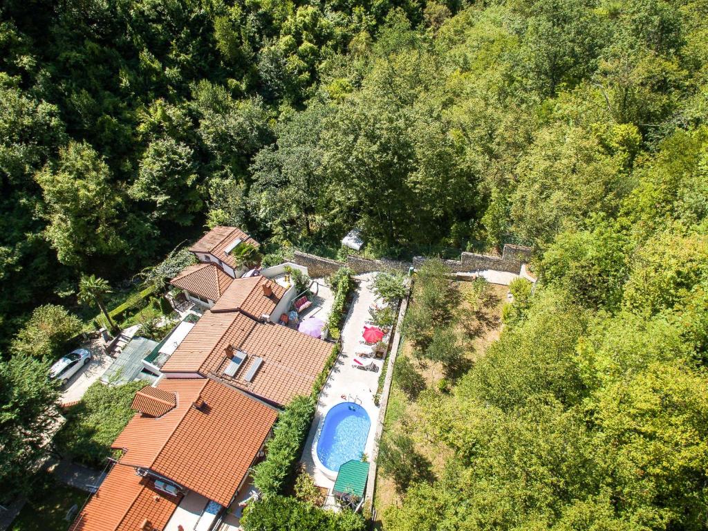 an overhead view of a house with a swimming pool at Holiday Home Karin by Interhome in Lovran