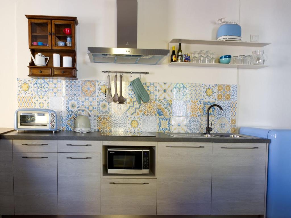 Kuchyňa alebo kuchynka v ubytovaní Apartment Canton Balin by Interhome