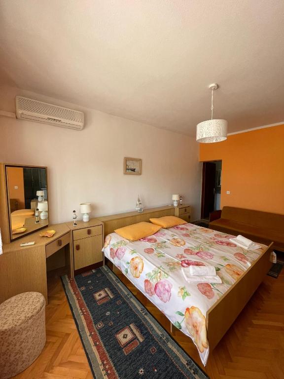 Postel nebo postele na pokoji v ubytování Apartmani Pavat